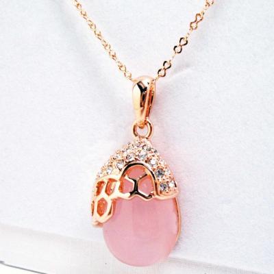 Honey Comb Rose Gold Tone Crystal Embedded Champagne Pink 15 inch Pendant.JPG